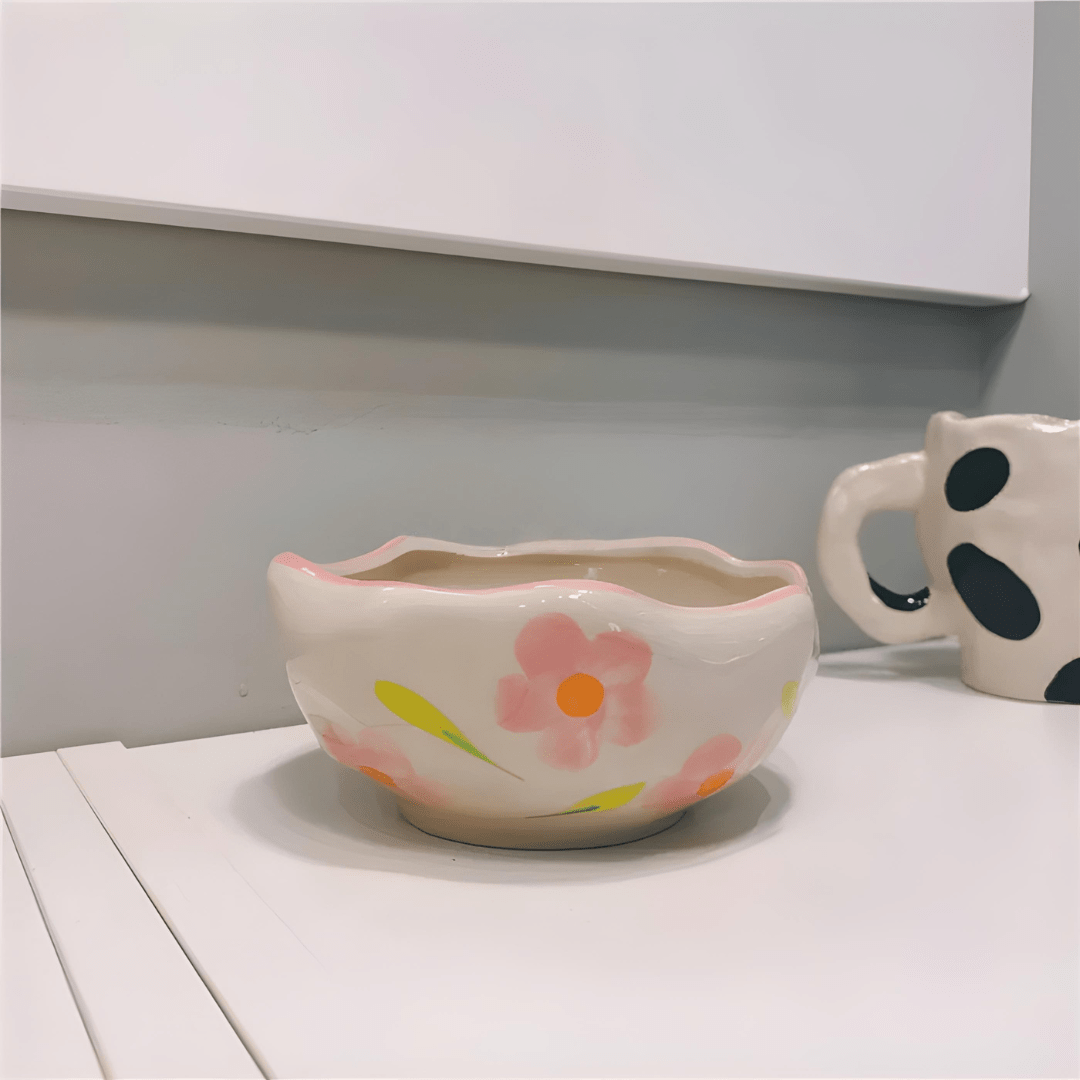 450ml yellow hand-pinched ceramic bowl filled with papaya, blueberries, and mint leaves.