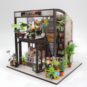 DIY miniature coffee house kit with LED lights, music box, and indoor café details – ideal for Beirut hobby crafters