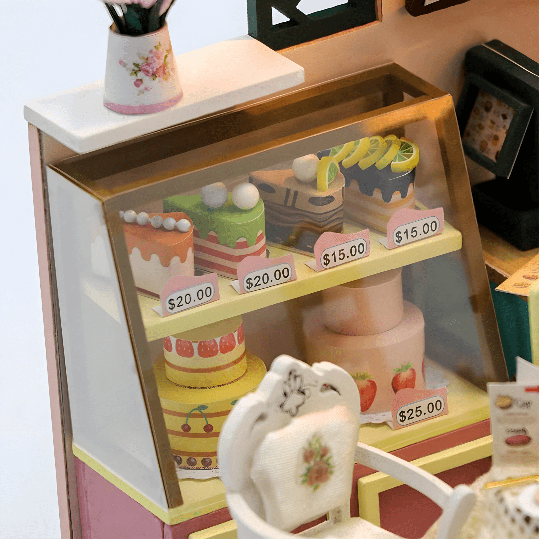 Dust-covered Sweet Cake Station miniature scene with cakes and décor