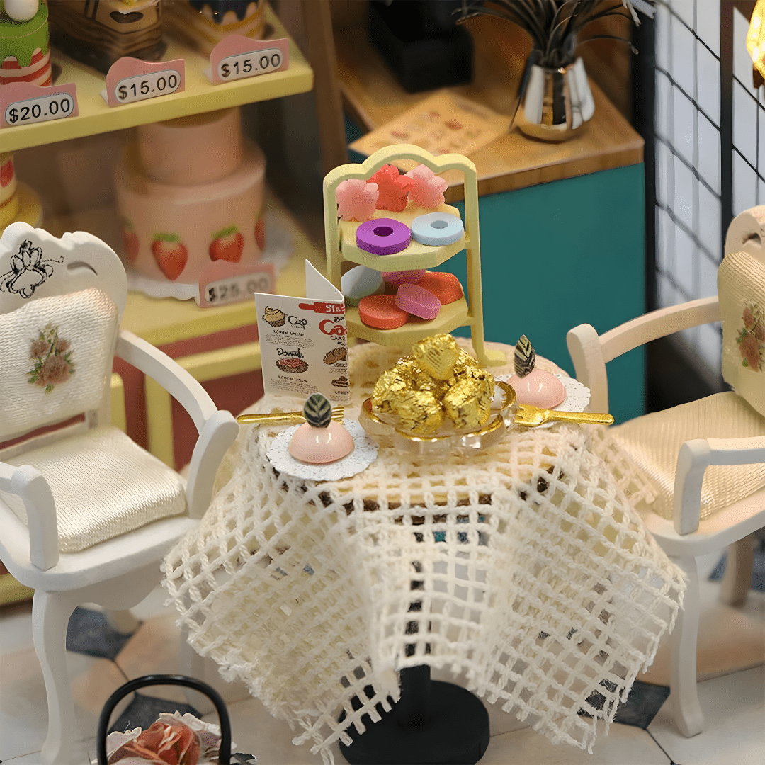 Dust-covered Sweet Cake Station miniature scene with cakes and décor