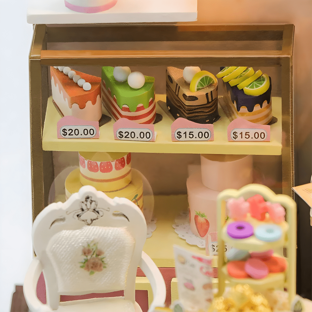 Dust-covered Sweet Cake Station miniature scene with cakes and décor