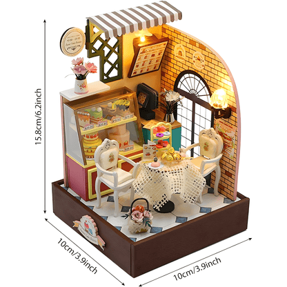 Dust-covered Sweet Cake Station miniature scene with cakes and décor
