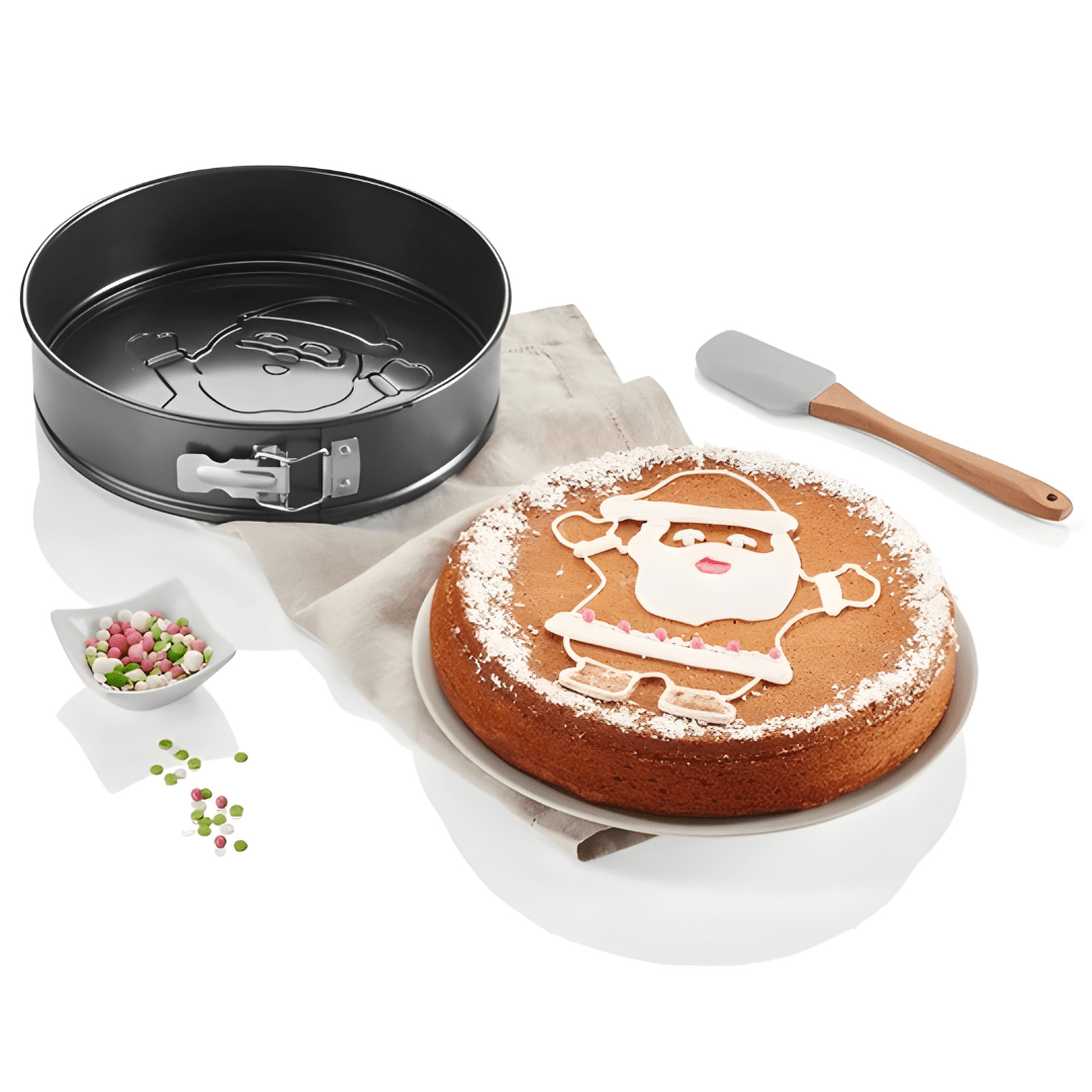 Christmas cake baked in Livarno Home Santa Claus cake tin, dusted with sugar.