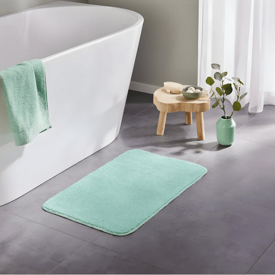 Green LIVARNO Home Bath Mat 45×70 cm styled with matching towel
