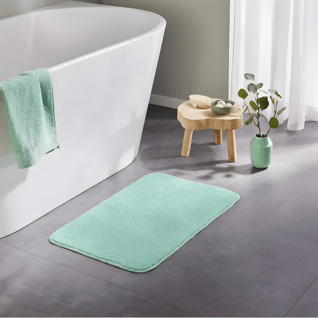 Green LIVARNO Home Bath Mat 45×70 cm styled with matching towel
