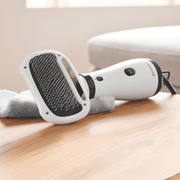 Zoofari 2-in-1 pet dryer with brush, 300W quiet grooming tool with rounded stainless steel bristles, gently dries and detangles all coat types.