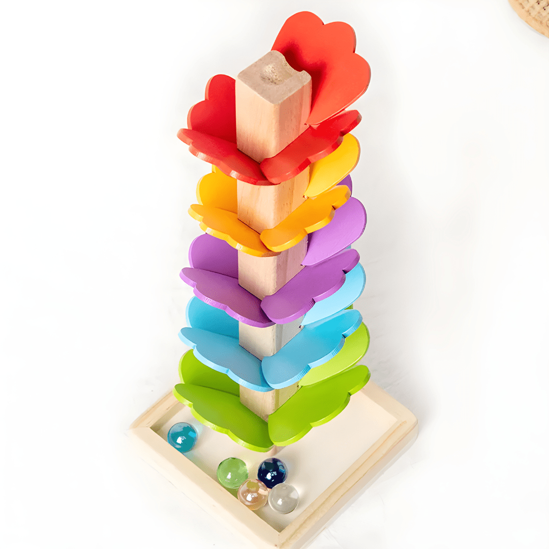 Montessori wooden marble tree toy with colorful leaves and marbles in the base, for ages 3+
