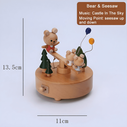Wooden bunny family music box playing melody with moving seesaw