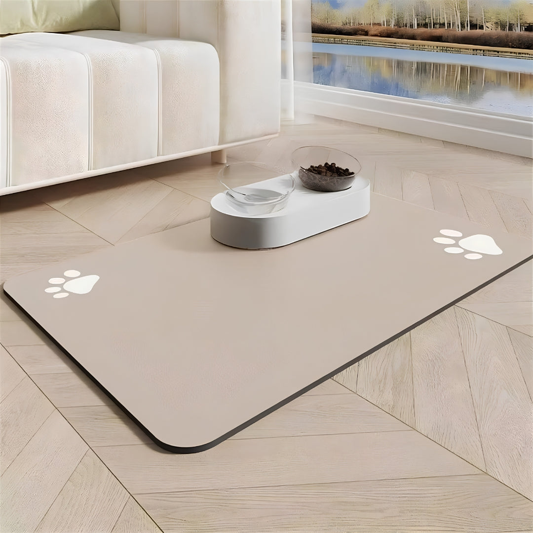Dark gray and light beige absorbent pet feeding mat with food bowls, featuring a waterproof non-slip rubber base. Pet supplies Beirut Lebanon.