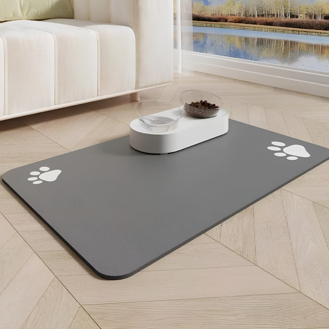 Dark gray and light beige absorbent pet feeding mat with food bowls, featuring a waterproof non-slip rubber base. Pet supplies Beirut Lebanon.