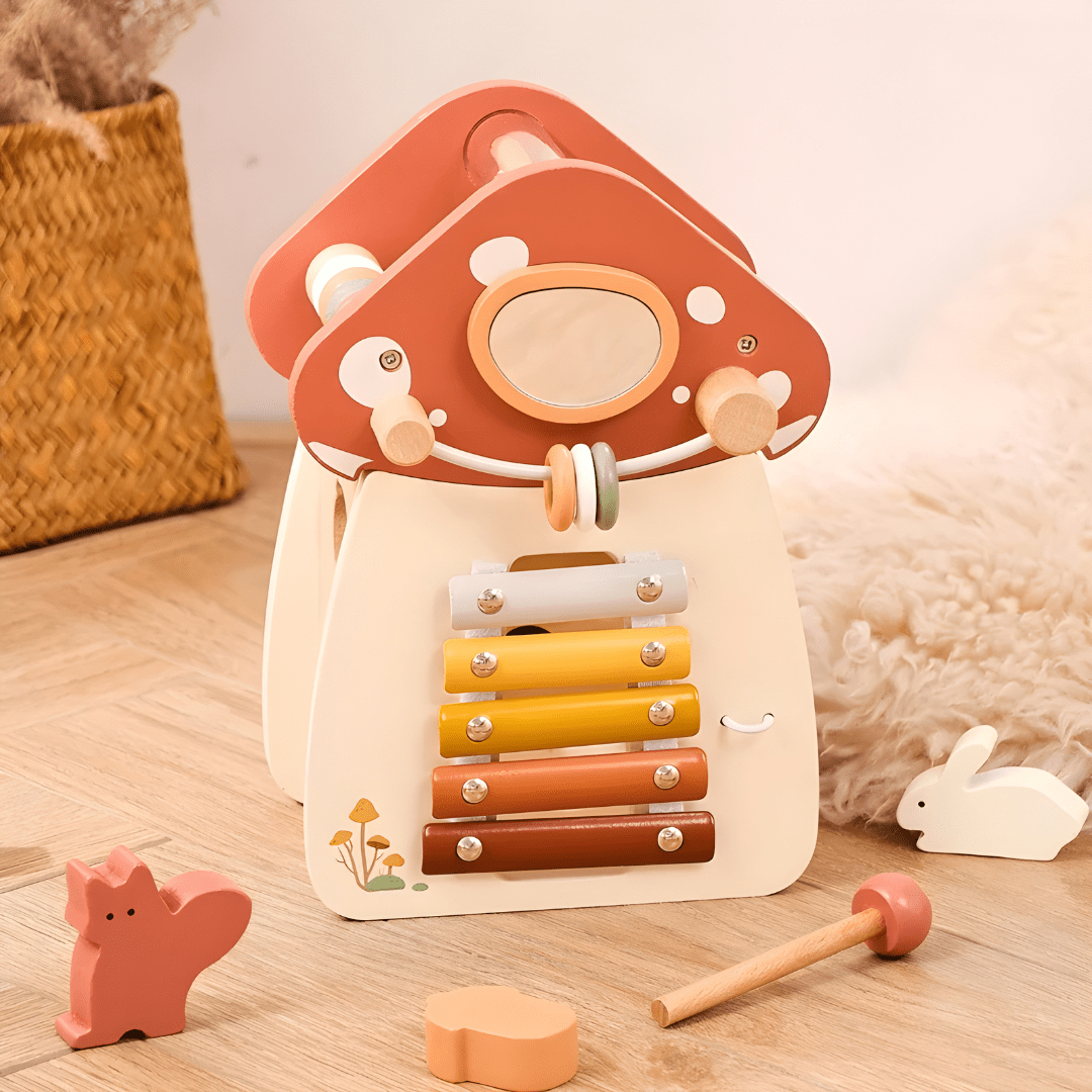 Wooden mushroom activity cube Montessori toy for toddlers in Beirut Lebanon with xylophone abacus shape sorter and busy board features