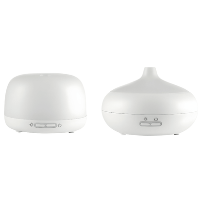 Silvercrest white ultrasonic aroma diffuser on a wooden table with cool mist rising, rechargeable Type-C aromatherapy device.