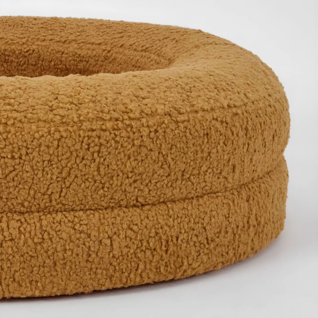Orthopaedic memory foam dog bed with soft teddy fabric and raised edges for comfort and joint support in Lebanon