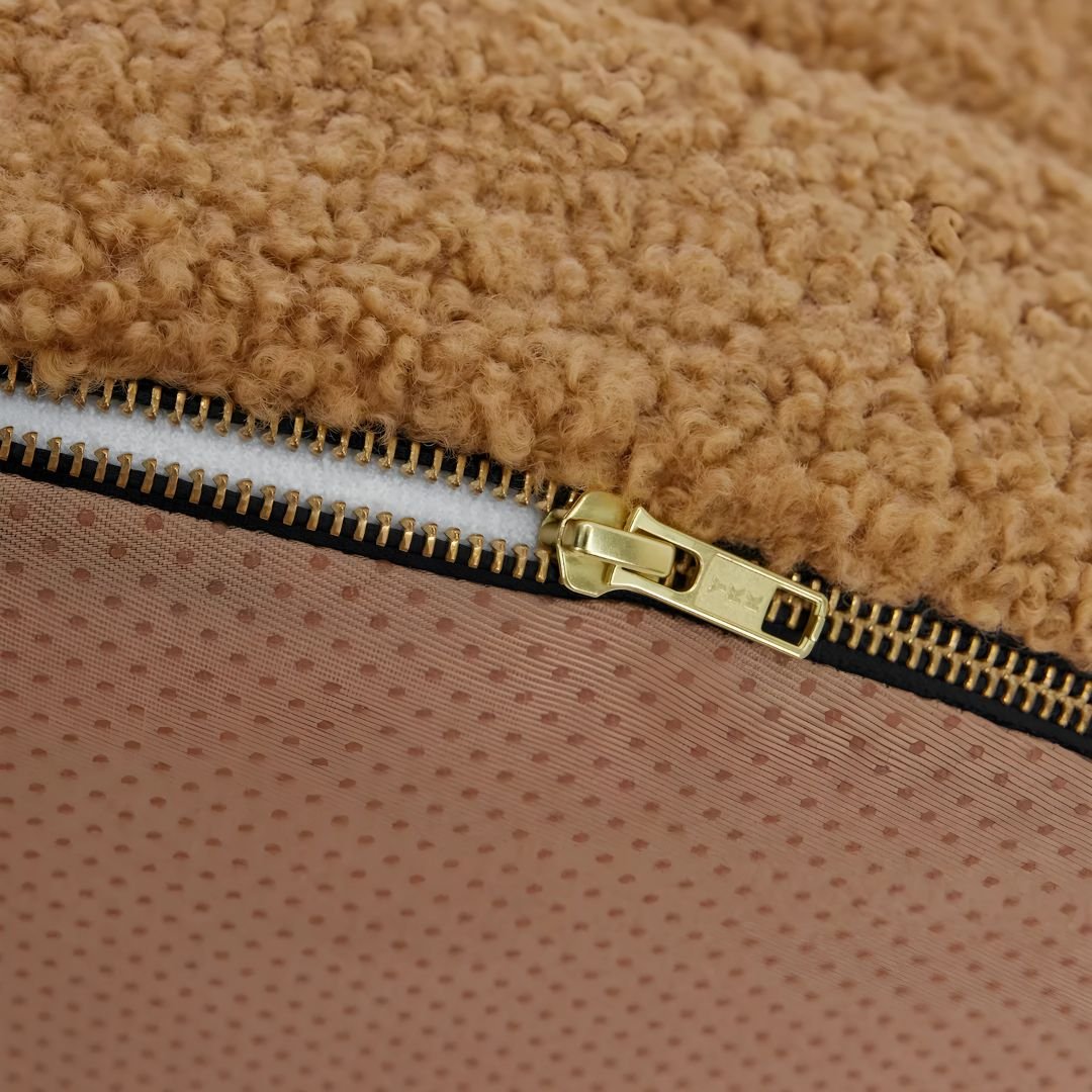 Orthopaedic memory foam dog bed with soft teddy fabric and raised edges for comfort and joint support in Lebanon