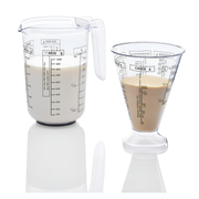 ERNESTO 2-piece clear plastic measuring jug set containing a 1-liter jug with handle and a 500ml nesting cup, available for delivery in Beirut, Lebanon.