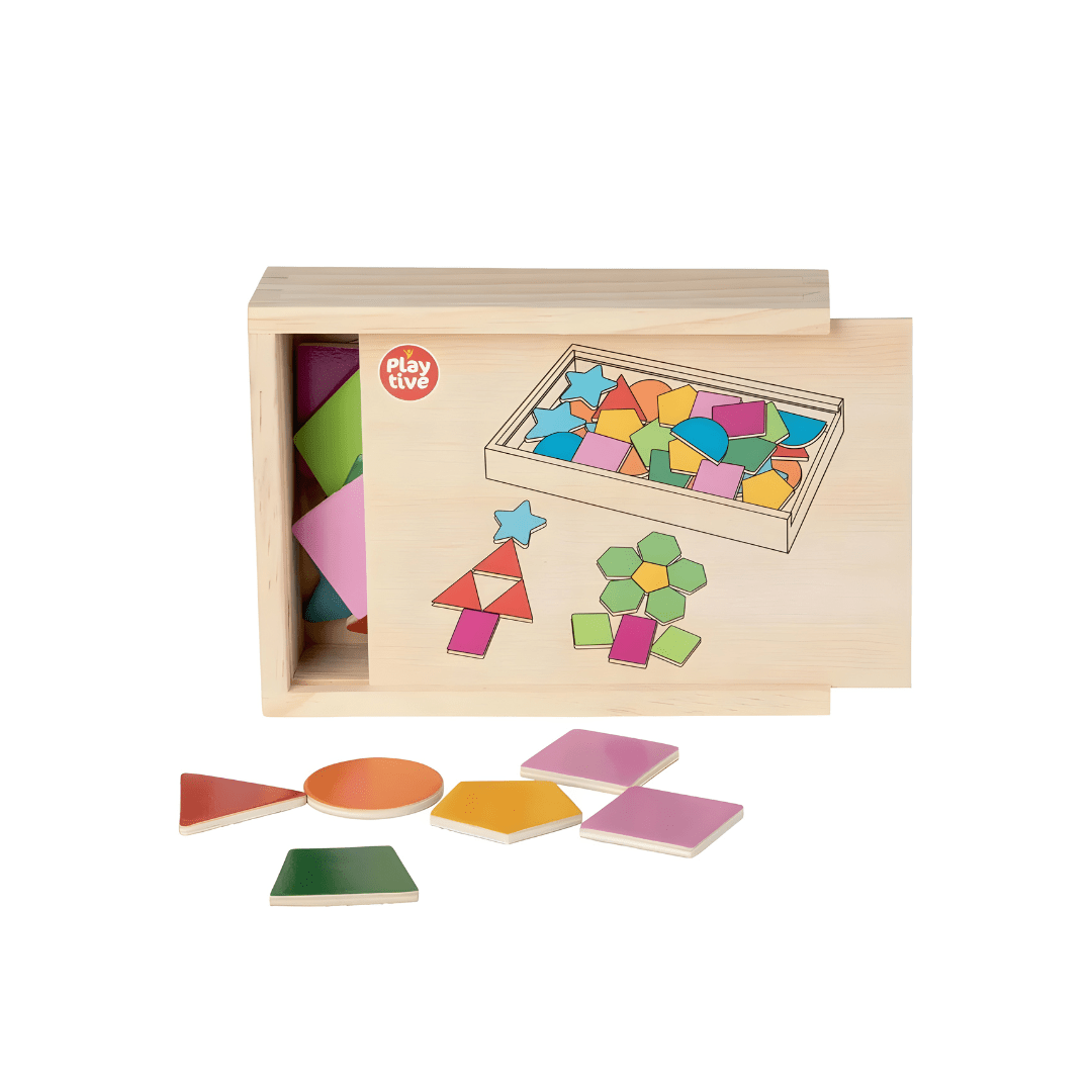 Playtive Wooden Magnetic Shapes set featuring a little girl playing with colorful geometric magnets on a wooden box in a bright playroom.