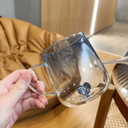 Transparent borosilicate glass cups with pink and blue heart designs, featuring gradient color and elegant handles – 400ml capacity.

