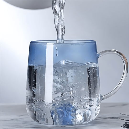 Transparent borosilicate glass cups with pink and blue heart designs, featuring gradient color and elegant handles – 400ml capacity.

