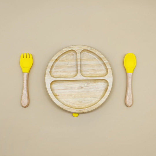 Round bamboo kids plate set with yellow silicone spoon and fork – suction base for toddlers