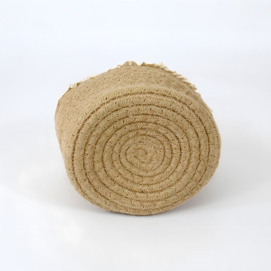 Natural jute storage basket with delicate lace trim, shown from the side on a clean background