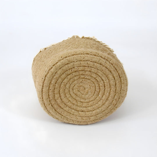 Natural jute storage basket with delicate lace trim, shown from the side on a clean background