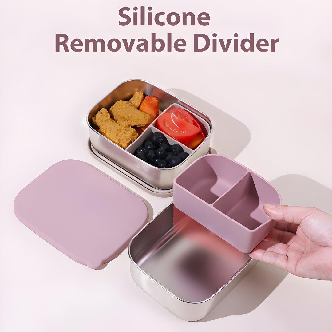 Removable pink silicone divider being placed into a stainless steel lunchbox, a practical meal prep solution from European House Hold