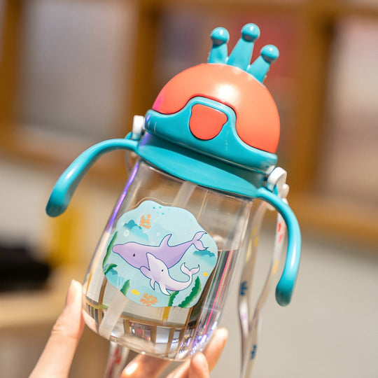 Cute 350ml BPA-free kids sipper water bottle with crown-shaped lid and animal prints – available in Elephant, Dolphin, and Penguin designs