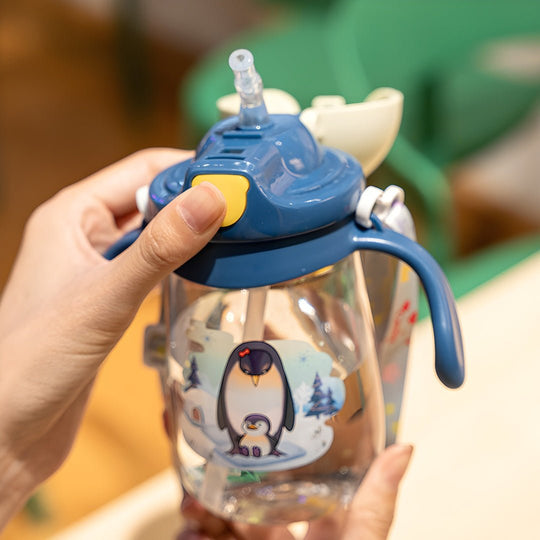 Cute 350ml BPA-free kids sipper water bottle with crown-shaped lid and animal prints – available in Elephant, Dolphin, and Penguin designs