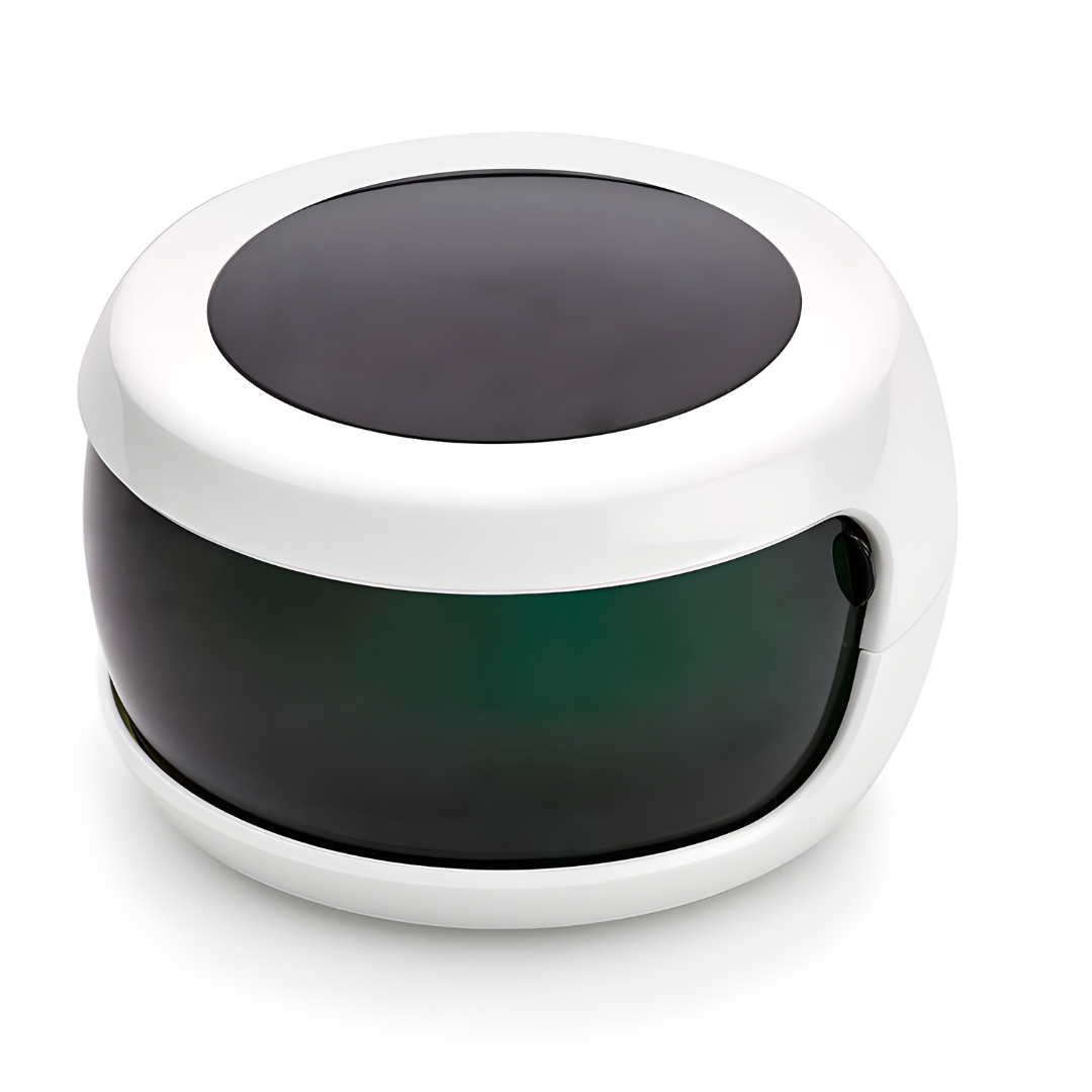 Portable white UV-C sterilizer box for sanitizing jewelry, watches, and glasses, shown with blue UV light technology for germ killing.